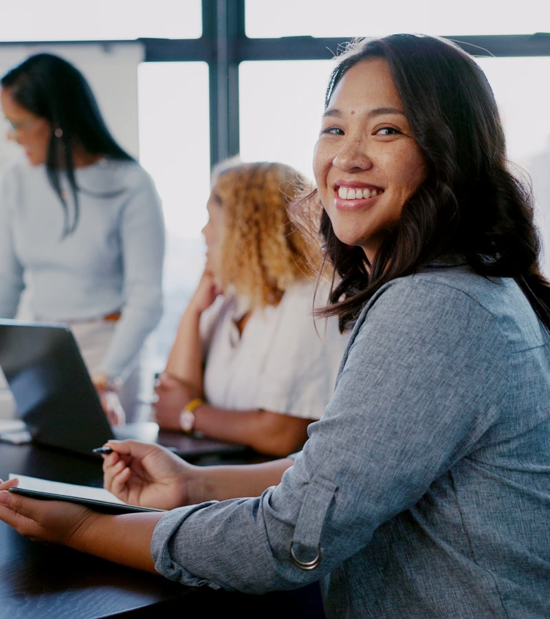 Smiling woman in a business meeting
