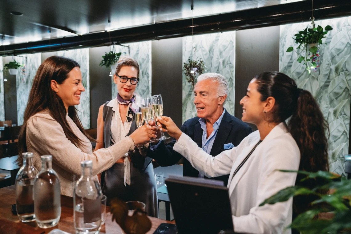 Professional celebration in modern setting