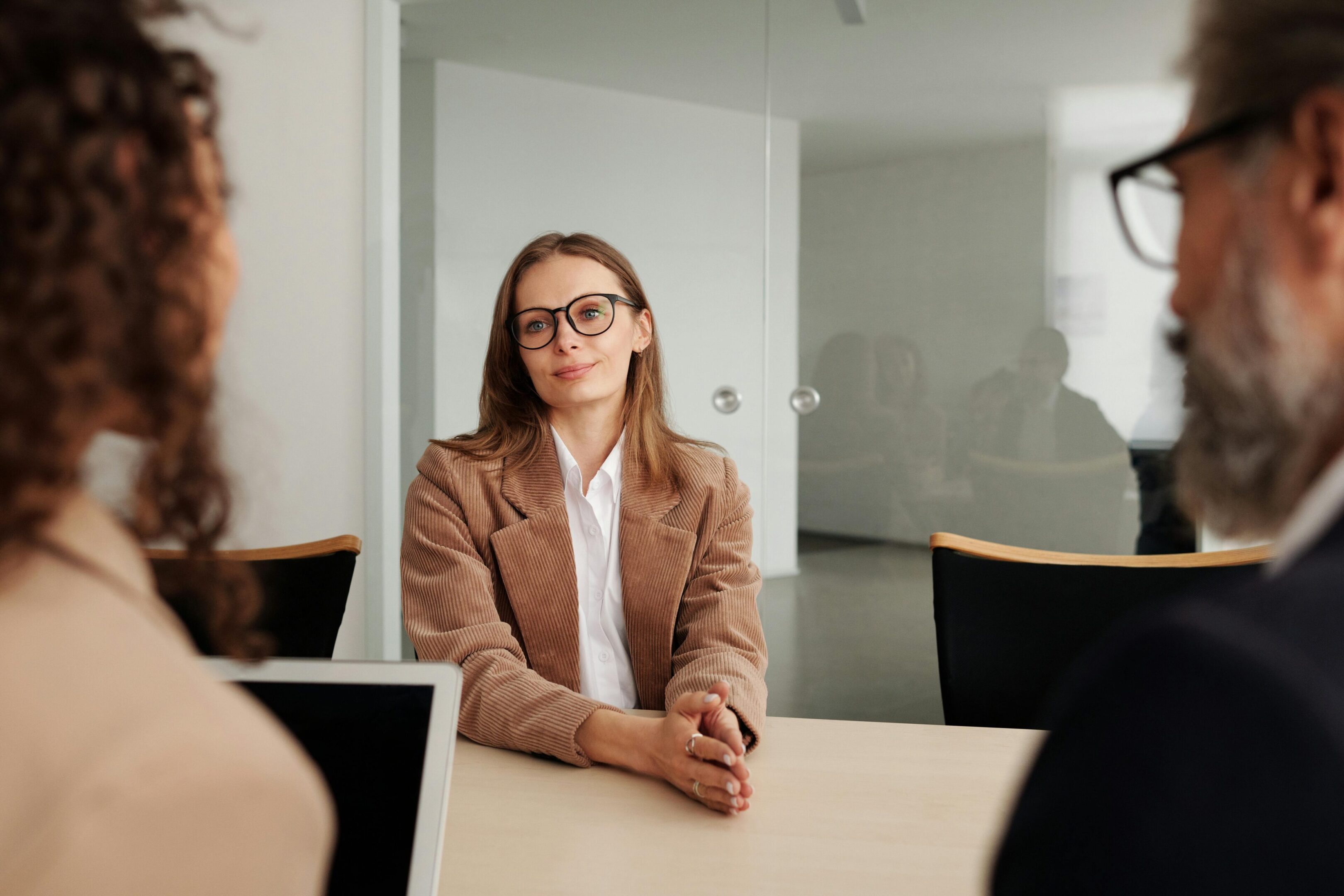 Business meeting with three professionals